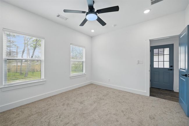 Carpeted spare room featuring baseboards, visible vents, and recessed lighting | Image 17