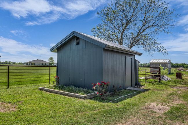 View of shed featuring fence | Image 8