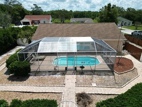 12125 Knotty Pine Loop, SAN ANTONIO, FL, 33576 | Card Image
