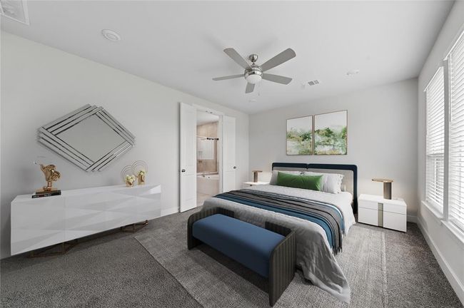 Virtually Staged Primary Retreat Conveniently Located on the Main Level | Image 9