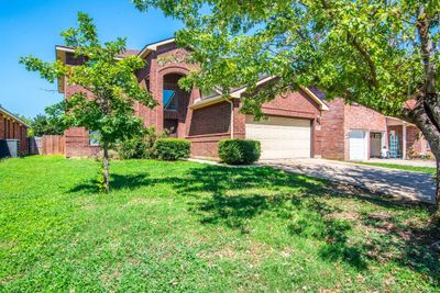 View of front of home featuring a front yard | Image 1