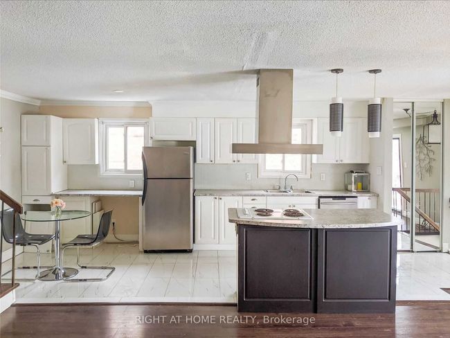 UPPER - 8 Pluto Dr, House attached with 3 bedrooms, 1 bathrooms and 2 parking in Brampton ON | Image 4
