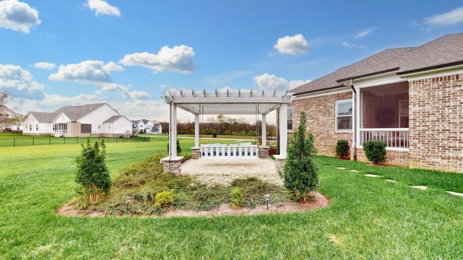 Over an acre of beautifully maintained space—plus, the adjacent lot will never be built on, offering rare, forever privacy and wide open views! | Image 63