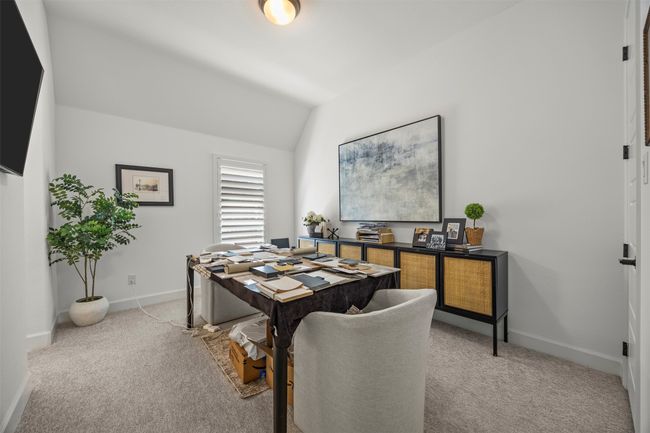 Office area with light colored carpet and lofted ceiling | Image 31