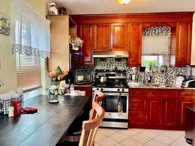 Eat-In Kitchen with Quartz Countertop &amp; S. S Appliances | Image 2