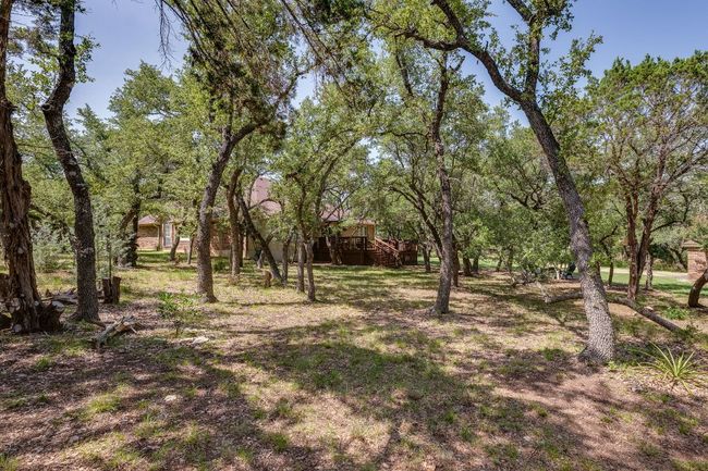 View of yard with stairway and a wooden deck | Image 5