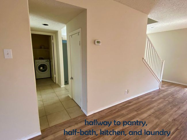 Hallway leading to washer / clothes dryer | Image 4