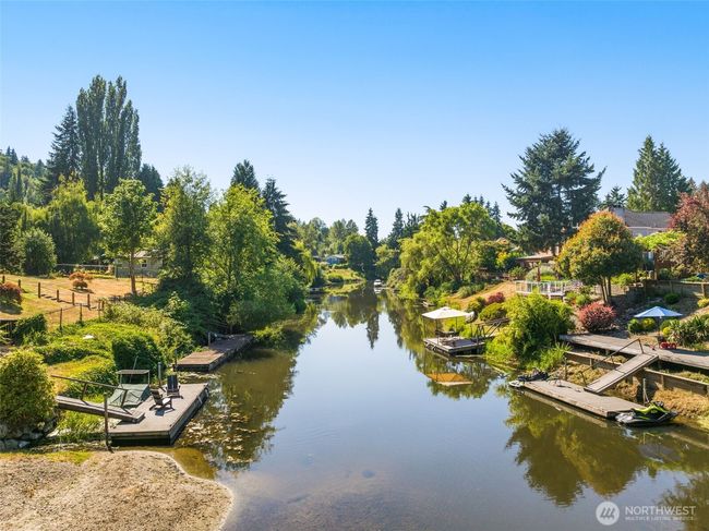 Watch the morning unfold in stillness, as the Sammamish River mirrors the sky and reflects a lifestyle of peace. | Image 30