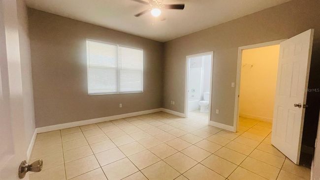1589 Cumin Dr, Home with 2 bedrooms, 2 bathrooms and null parking in POINCIANA FL | Image 14