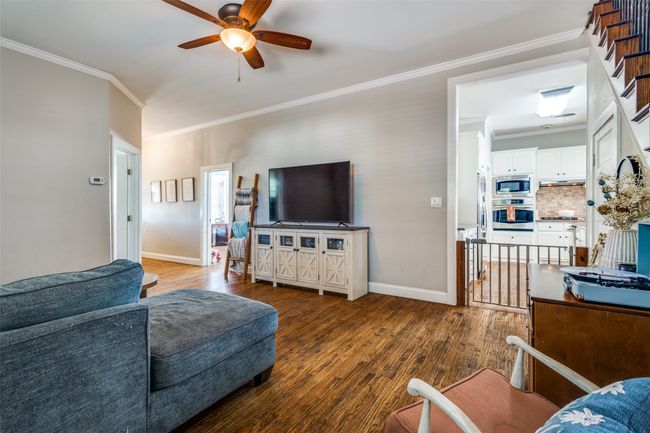 The living room has sitelines to your updated kitchen. | Image 8