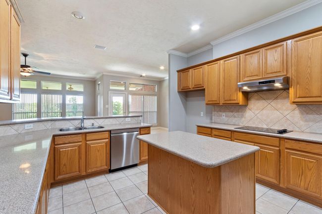 Gorgeous granite island kitchen with Stainless steel appliances and counterspace galore! | Image 14