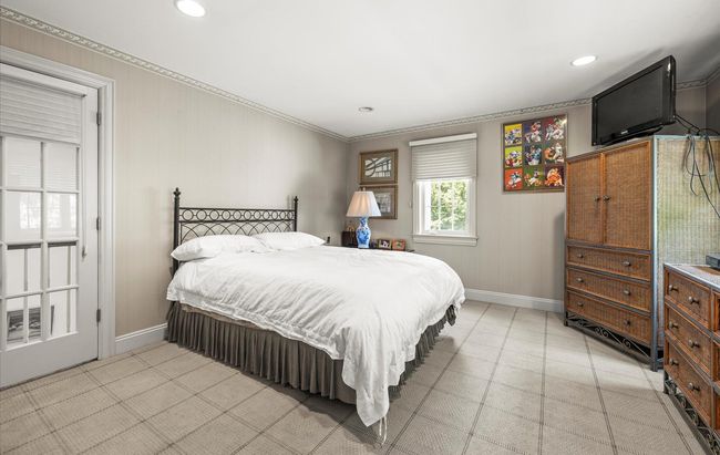 Bedroom with baseboards, recessed lighting, and crown molding | Image 27