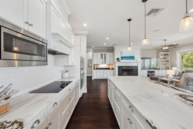 Lots of beautiful stone countertops to make meal prep and entertaining a breeze. | Image 29