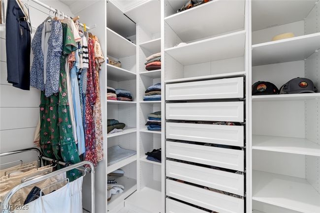 View of walk in closet | Image 26