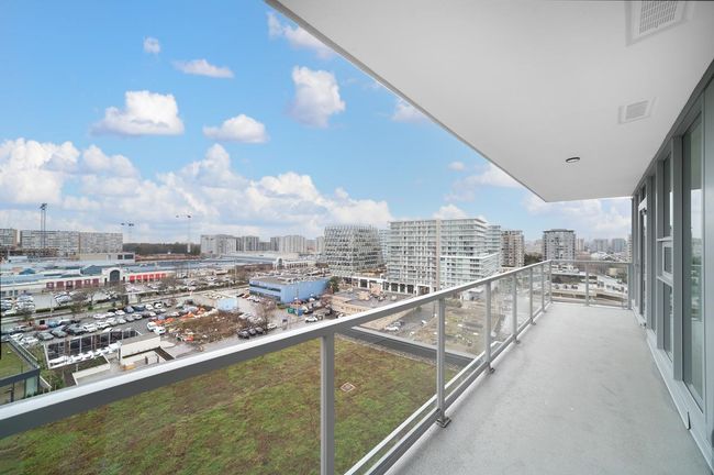 Balcony featuring a city view | Image 16