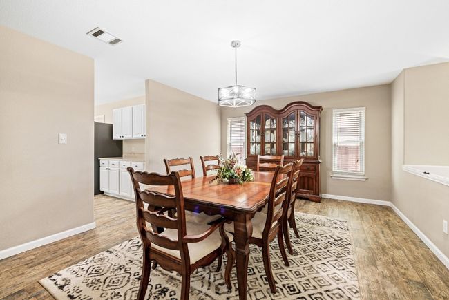 The dedicated formal dining room provides an ideal setting for dinner parties, celebrations, and holiday meals. | Image 10