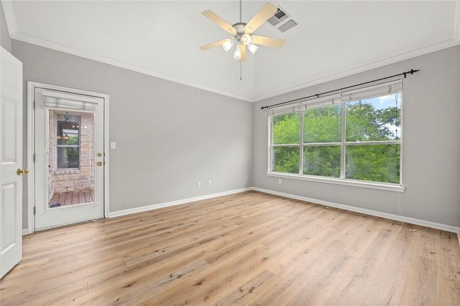 High ceilings and door to outdoor deck in Master suite | Image 14
