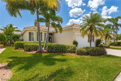 View of front of property featuring a garage and a front lawn | Image 2