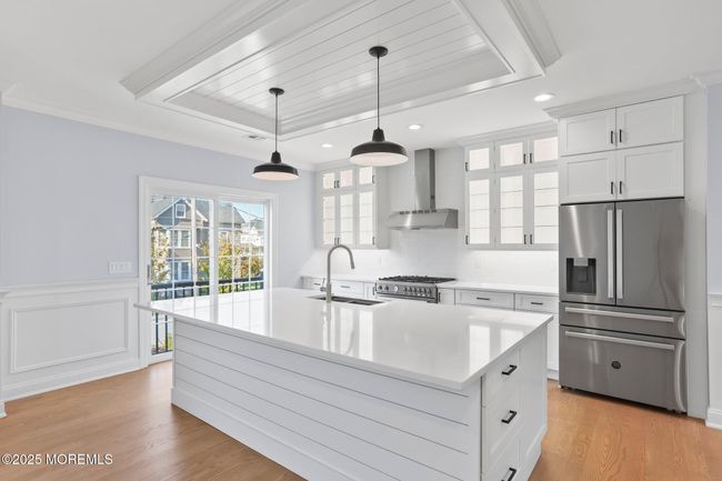 kitchen island (9-feet), sliding doors to Juliette balcony | Image 13