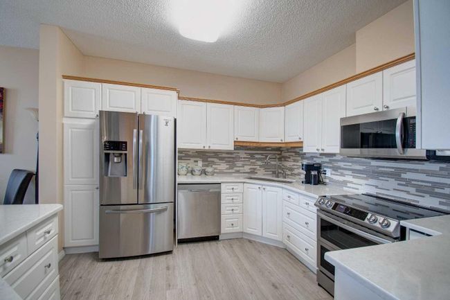 213 - 5201 Dalhousie Drive Nw, Home with 2 bedrooms, 2 bathrooms and 2 parking in Calgary AB | Image 7