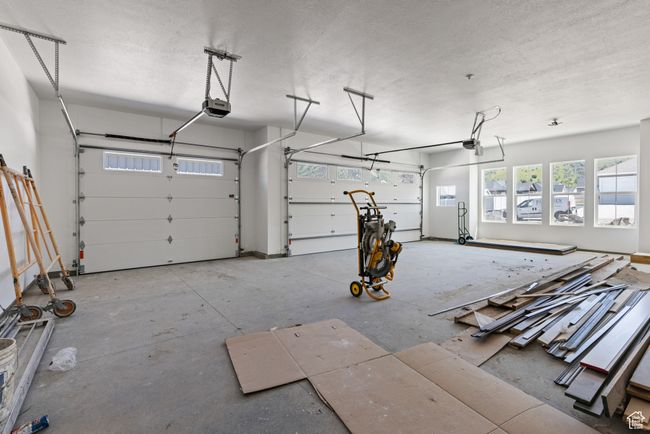 Garage featuring a garage door opener | Image 29