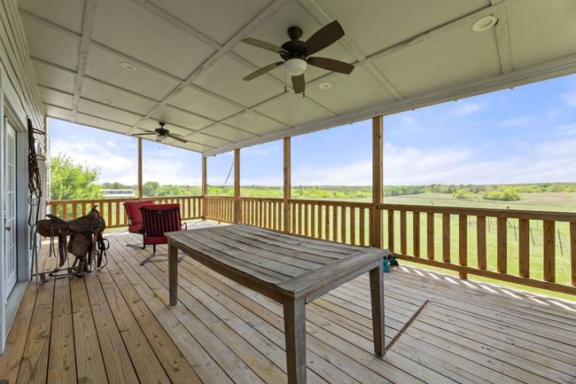 Deck featuring ceiling fan | Image 23