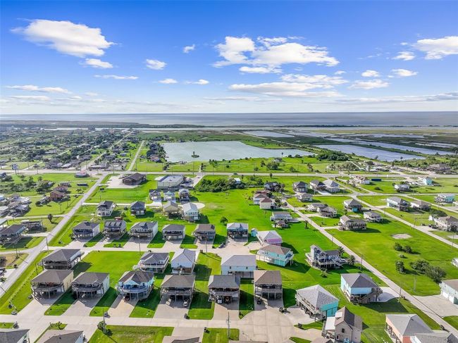 The ultimate beach getaway or rental investment! Just 6 blocks from the shore, this spacious fully furnished home sleeps up to 16 guests and offers a peaceful setting for memory-making or maximizing rental income potential. | Image 33