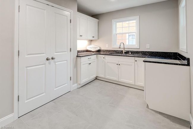 Oversized laundry room with pantry & prep area | Image 13