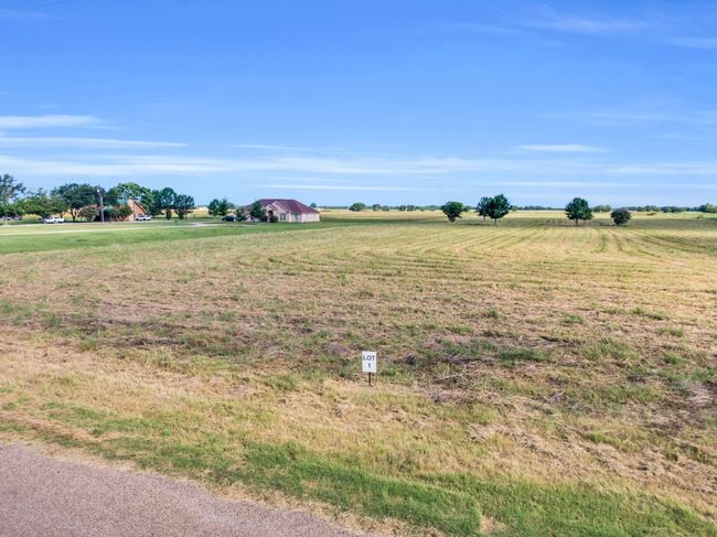 View of yard with a view of countryside and an outdoor structure | Image 10