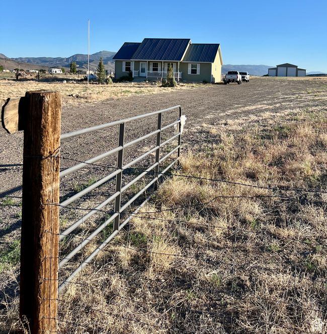 View of yard featuring a view of rural / pastoral area and a mountain view | Image 50