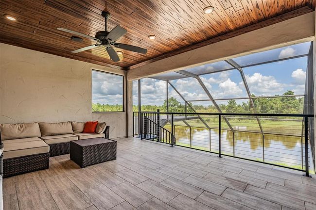 Upstairs covered & screened lanai | Image 44