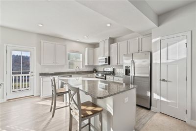 Stainless appliances, granite tops & pantry | Image 3