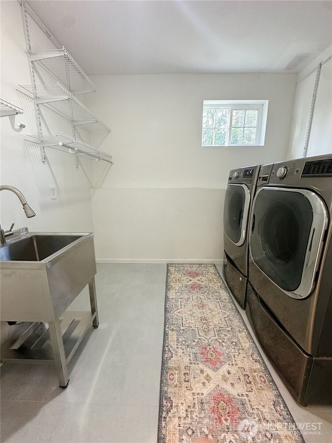 A perfectly functional and cute laundry room. | Image 34