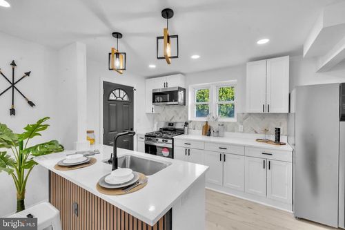 1306 E 35th St, BALTIMORE, MD, 21218-3032 | Card Image