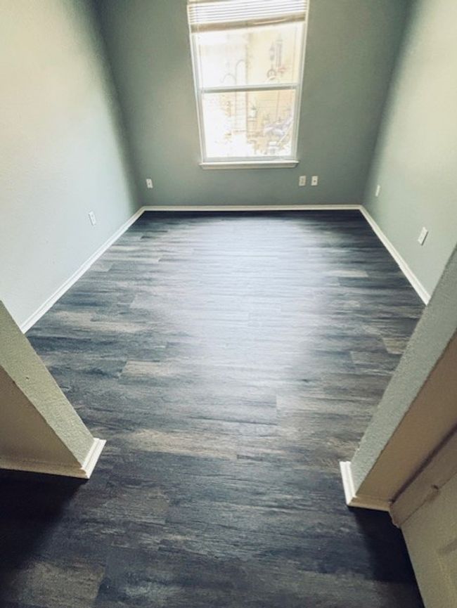 Unfurnished room featuring dark wood-type flooring | Image 13