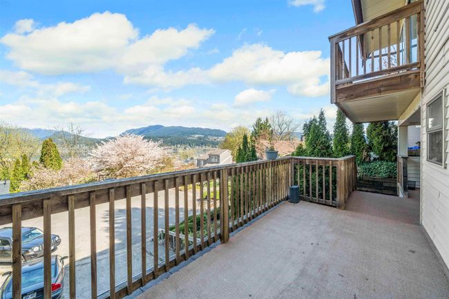Balcony featuring a mountain view | Image 38