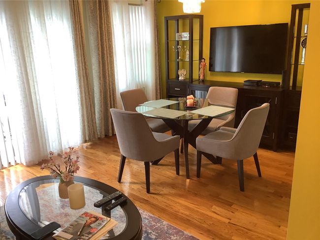 Dining space featuring light wood-type flooring | Image 7