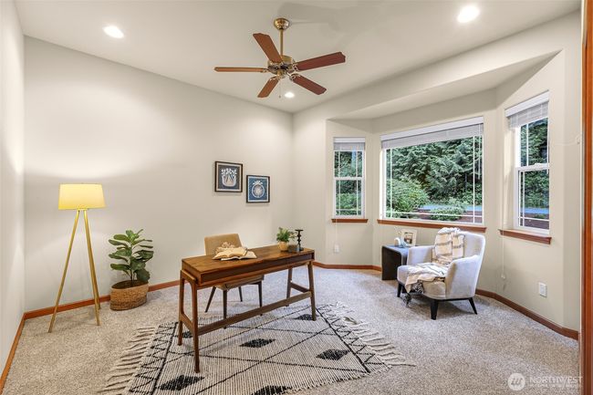 Second bedroom on the main level with a walk-in closet | Image 19