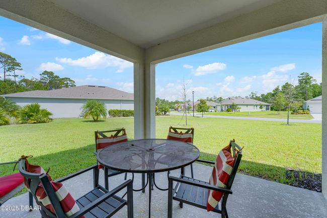 Open and Airy Covered Porch, just off the Living Room | Image 24