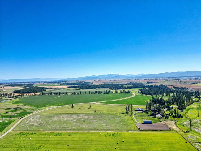 view of property from north (Home in the trees on the right) | Image 114