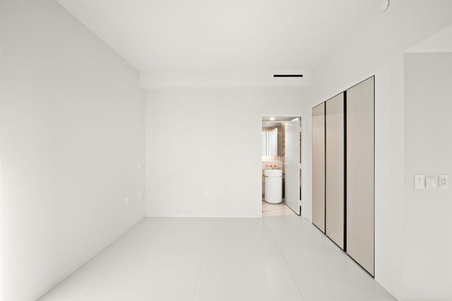 Interior space featuring light tile patterned floors | Image 8