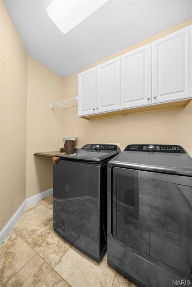 Main Floor Laundry just off the 4 car garage. | Image 17