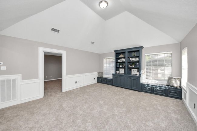 Game room with custom built-ins. | Image 21