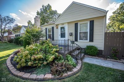 Charming and cozy! This 3-bedroom home on Norwaldo Ave boasts a spacious yard with beautiful landscaping and a welcoming front patio. Located near top local attractions and schools, it's perfect for families wanting a bustling neighborhood feel. | Image 1