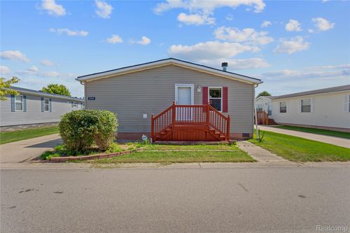 8099 Conover Dr, Willis, MI, 48191-9661 | Card Image
