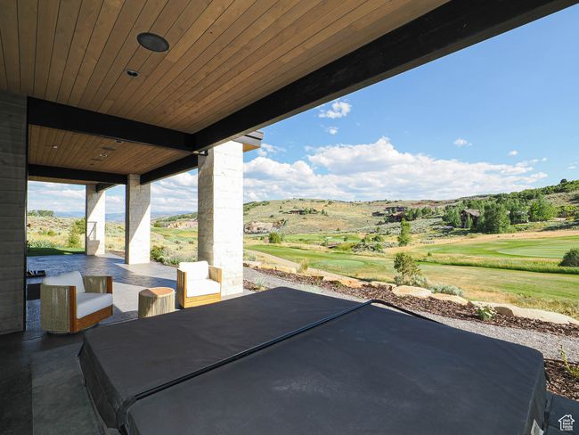 View of patio / terrace with view of golf course | Image 16