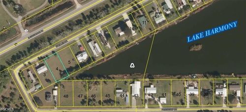 1125 W Miller Dr, MOORE HAVEN, FL, 33471-4966 | Card Image