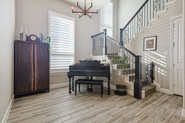 Dining Room currently being used as Piano Room showing flexibility. | Image 6