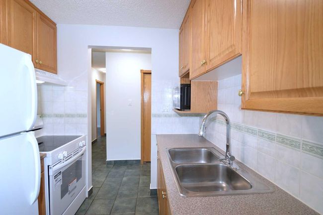 303 - 635 56 Avenue Sw, Condo with 2 bedrooms, 1 bathrooms and 1 parking in Calgary AB | Image 11