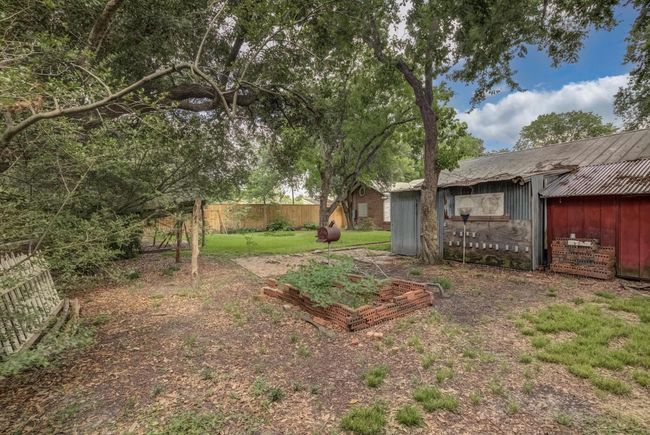 Shed behind garage. | Image 24